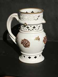 White and gold puzzle jug